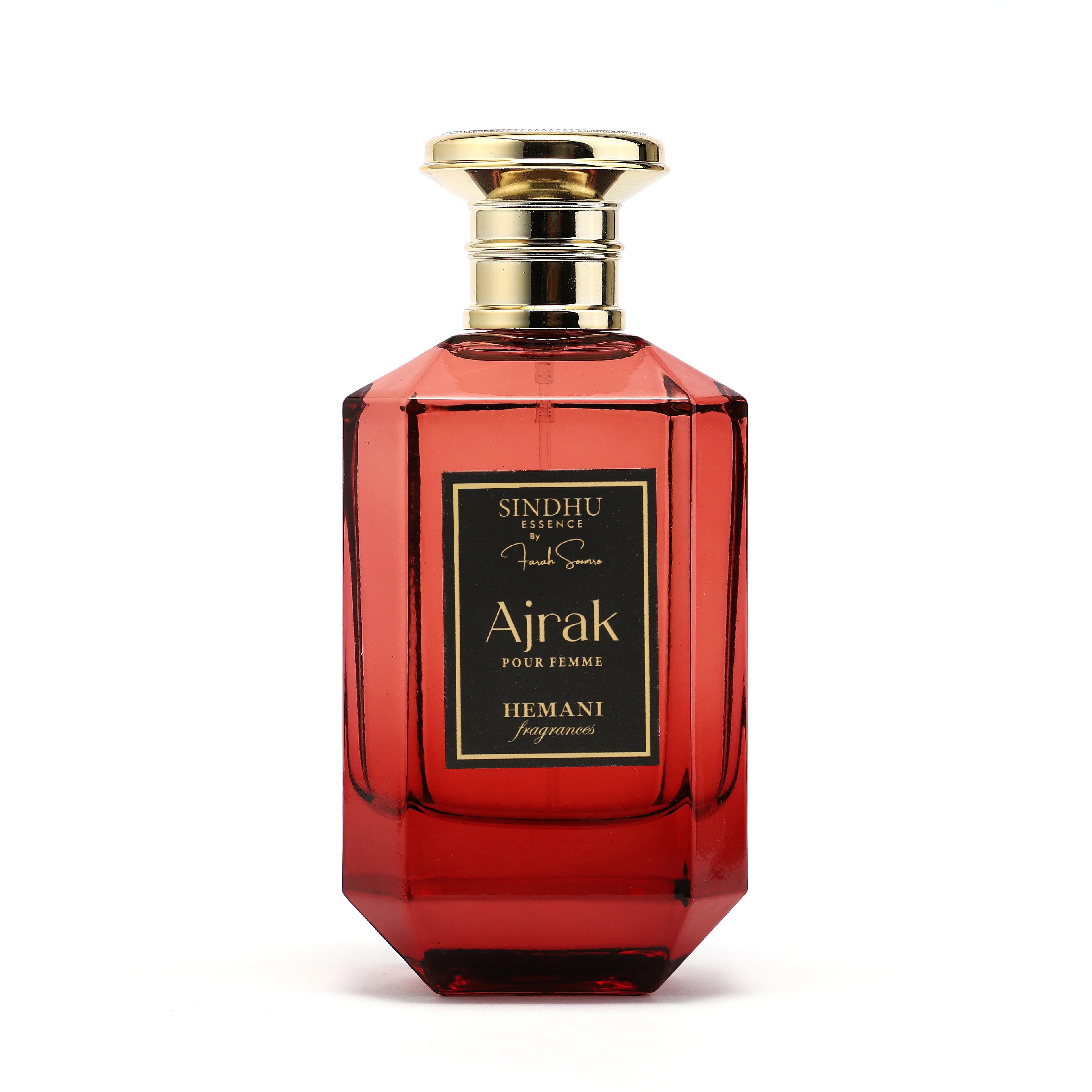 Ajrak Pour Femme by Hemani Fragrances, a luxurious red perfume bottle with gold accents