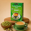 Hemani Kadak Elaichi Chai box with cardamom pods and steaming tea cup, natural herbal tea for digestion and freshness