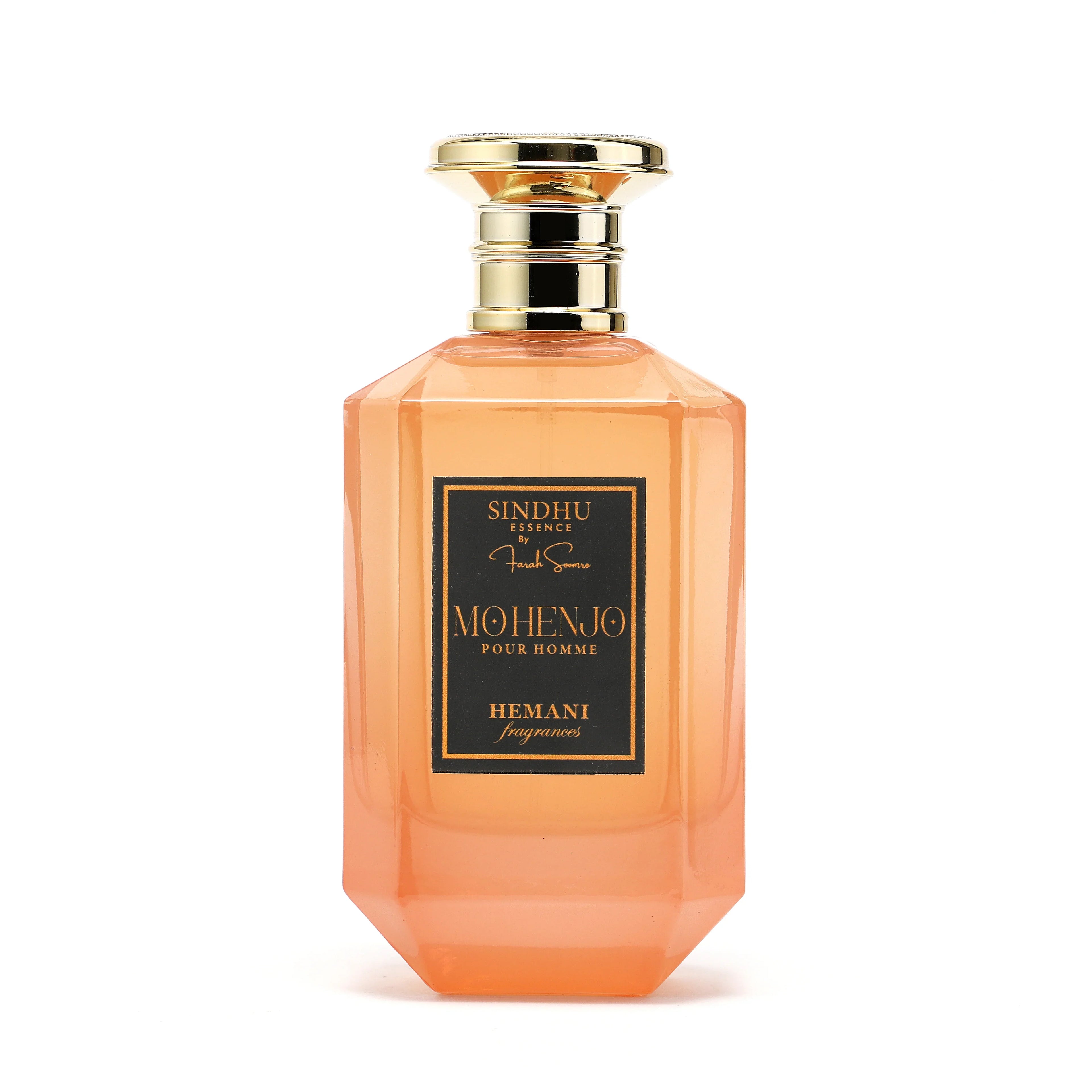 Mohenjo Pour Homme fragrance by Hemani, featuring a sleek orange bottle with gold accents and elegant label design.