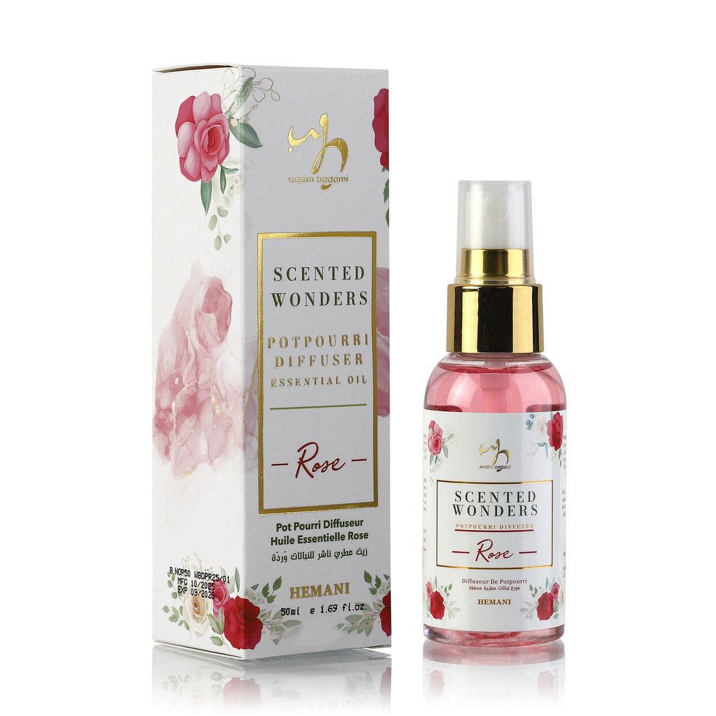 Rose-scented potpourri diffuser essential oil in elegant bottle with floral packaging