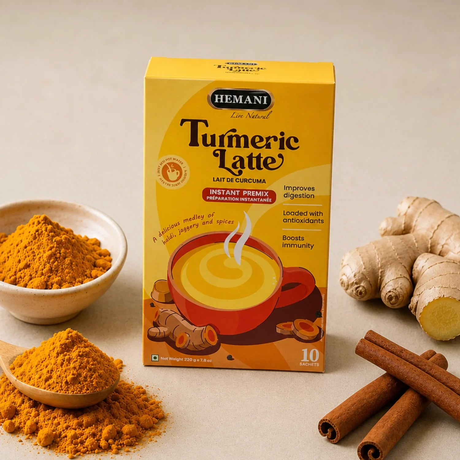 Hemani Turmeric Latte instant premix box with turmeric powder, ginger, and cinnamon sticks